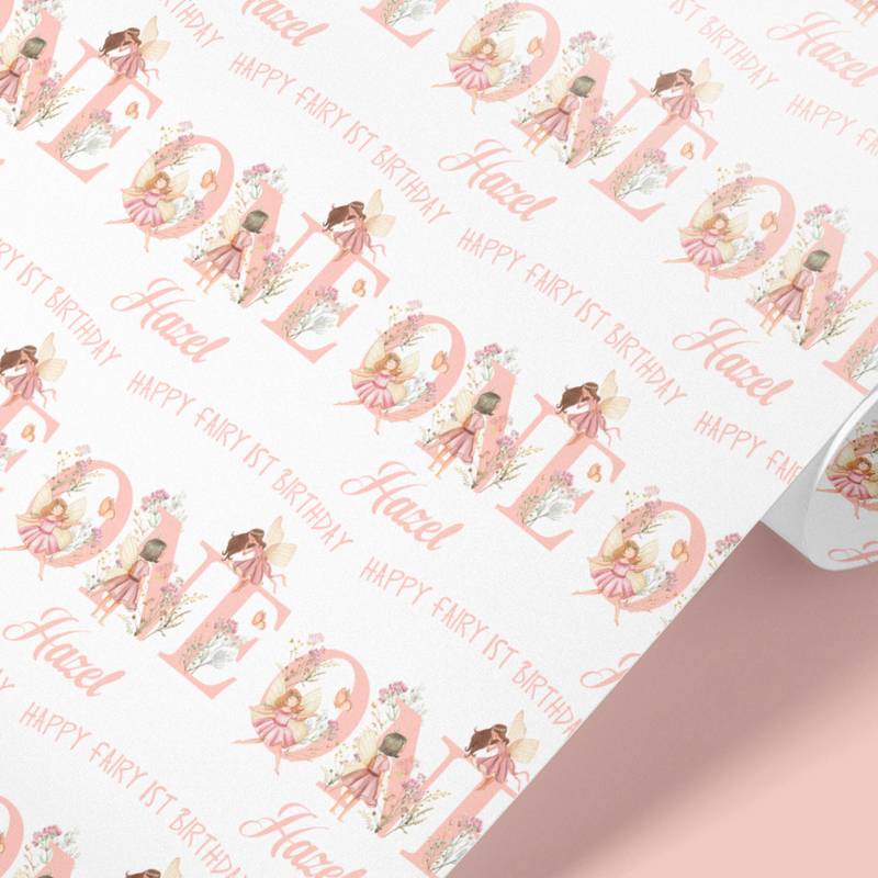 Close-up of floral fairy letters spelling ONE on custom birthday wrapping paper
